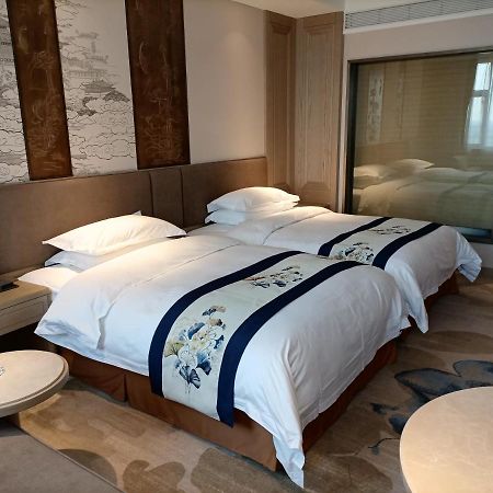 Baoying Jinling Hotel Bagian luar foto