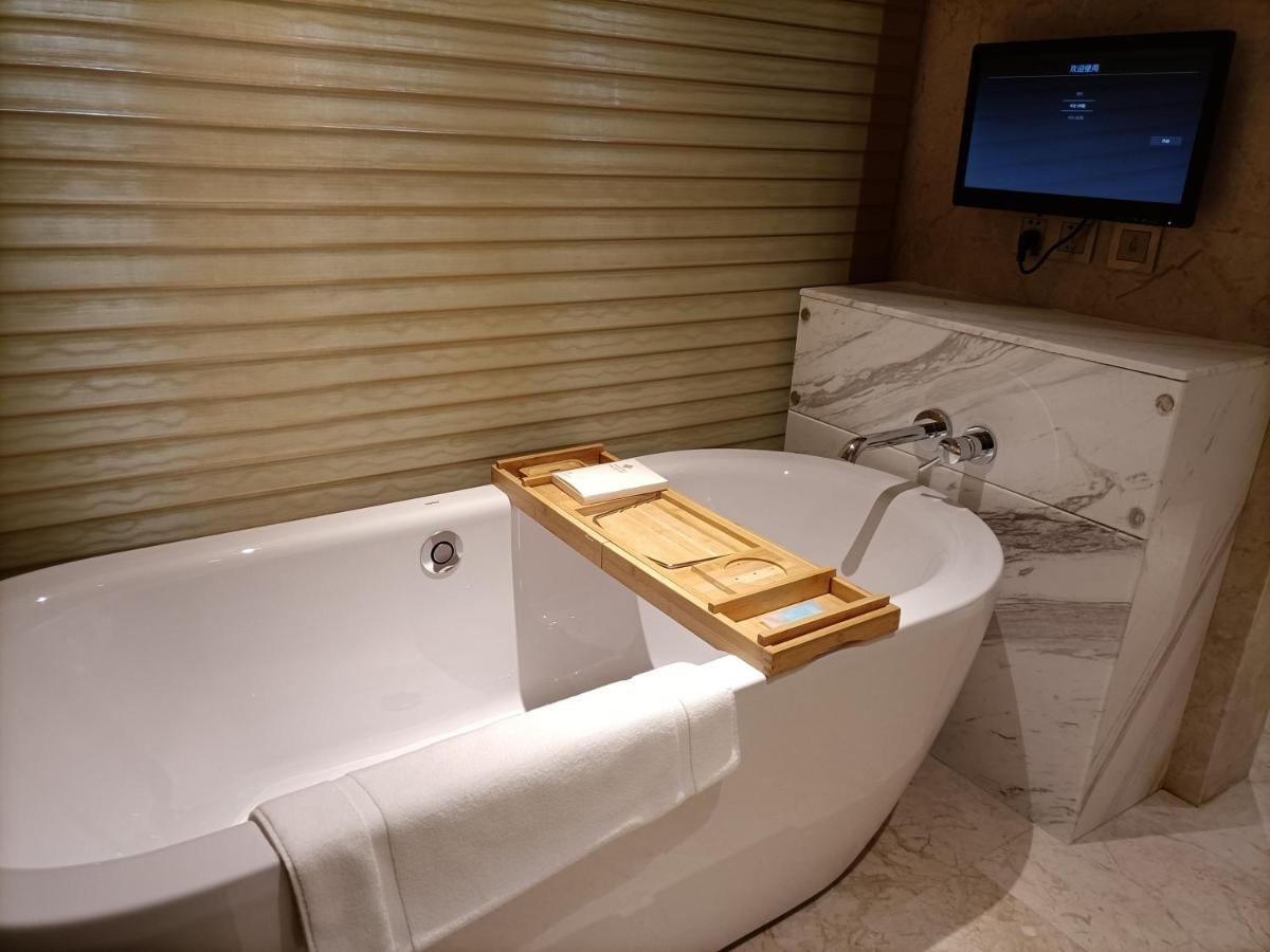 Baoying Jinling Hotel Bagian luar foto