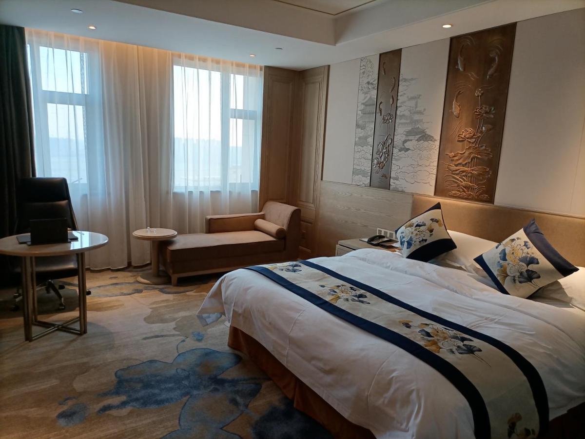 Baoying Jinling Hotel Bagian luar foto