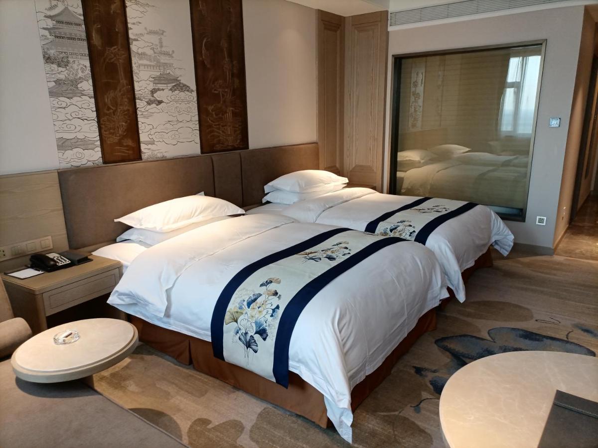 Baoying Jinling Hotel Bagian luar foto
